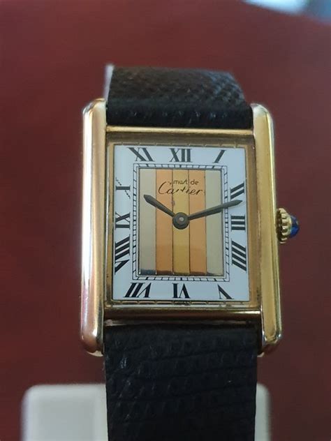 cartier tank vermeil trinity dial